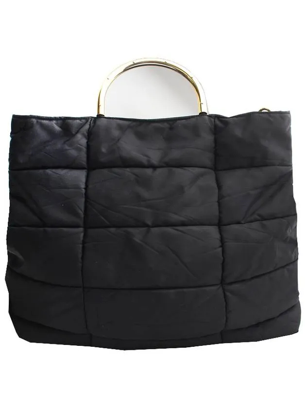 Black padded gold handle tote bag